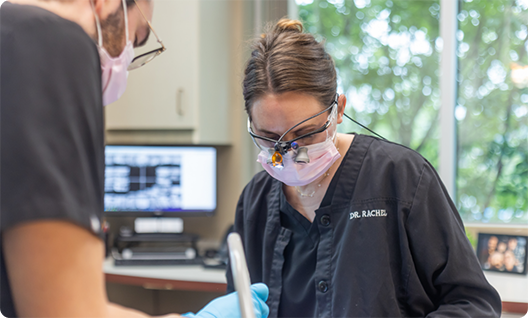 Dr Rachel treating a patient