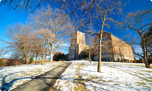 University campus with snow on the ground