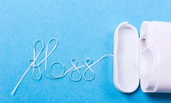 Floss spells “floss” in cursive