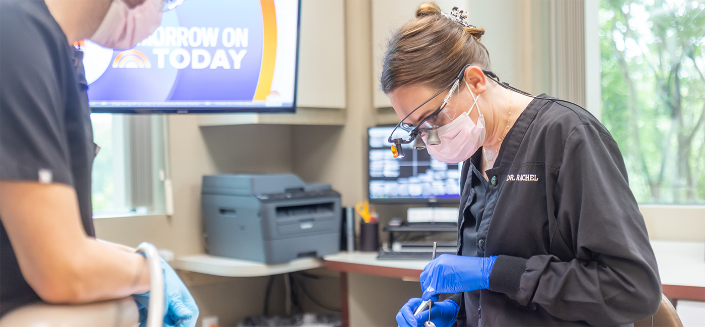 Little Rock dentist Dr Rachel performing a checkup